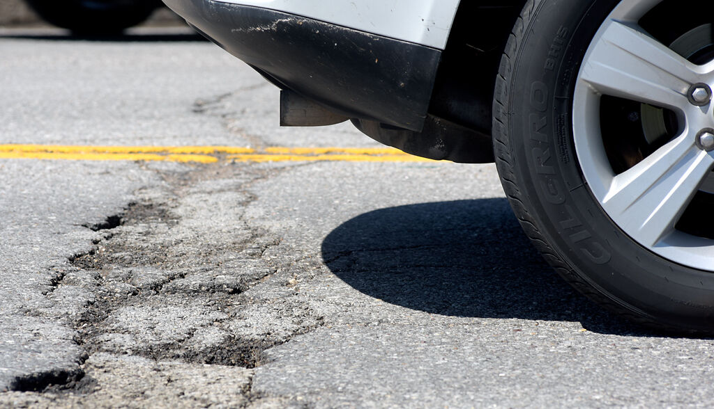 Asphalt cracks on Old 63